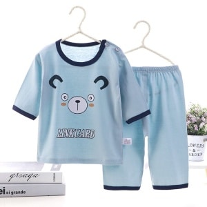 Pijama de verano de algodón azul para niños con motivo de gato en un cinturón con libros